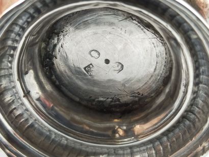 Large silver tulip-shaped tumbler, base decorated...