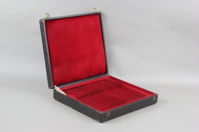 Wooden box with leather on the top of the...