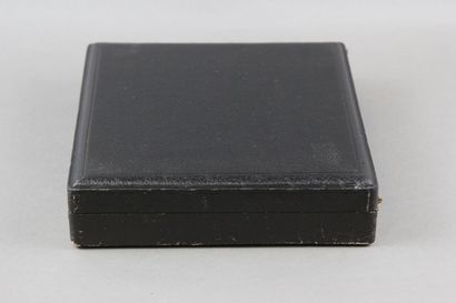 Wooden box with leather on the top of the...