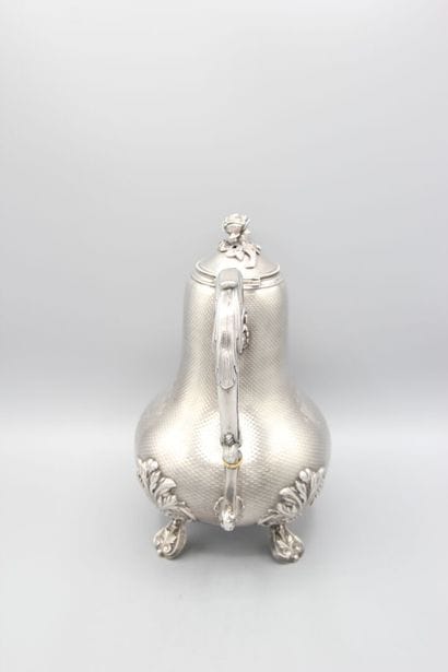 Silver coffee pot
Decorated with guilloche.
Rests...