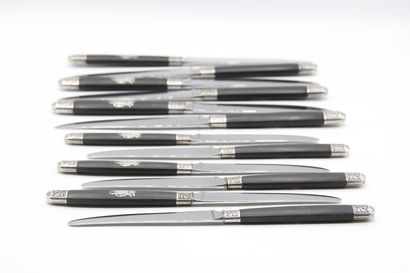 Double Set of knives with ebony handles inlaid...