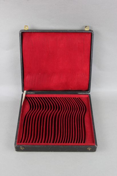 Wooden box with leather on the top of the...