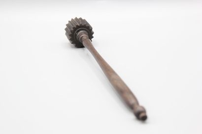 Wooden pusher for chocolate maker.
Rosewood...