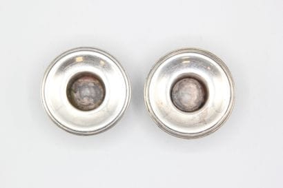 Pair of silver bobèches bordered with nets....