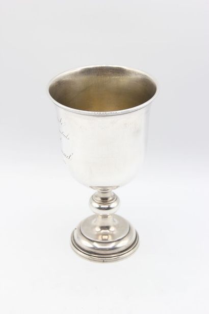 Cup on foot in silver.
On the body is inscribed...