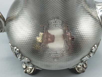 Silver coffee pot
Decorated with guilloche.
Rests...