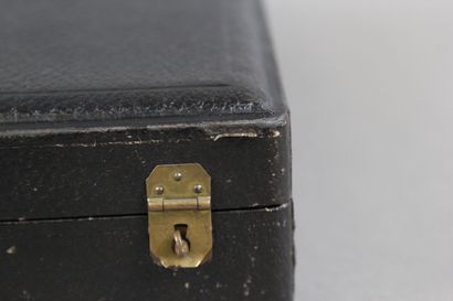 Wooden box with leather on the top of the...