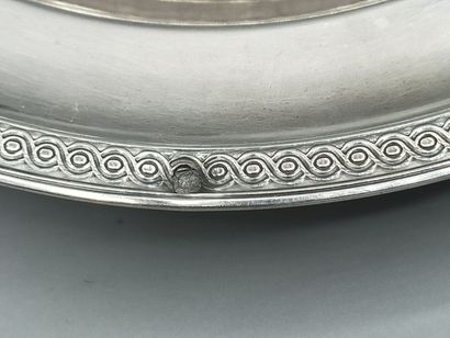 Bottle coaster in silver.
Border decorated...