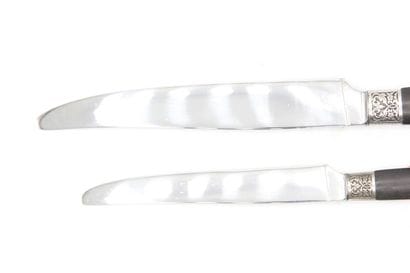 Double Set of knives with ebony handles inlaid...