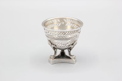 Silver egg cup with three clawed feet with...