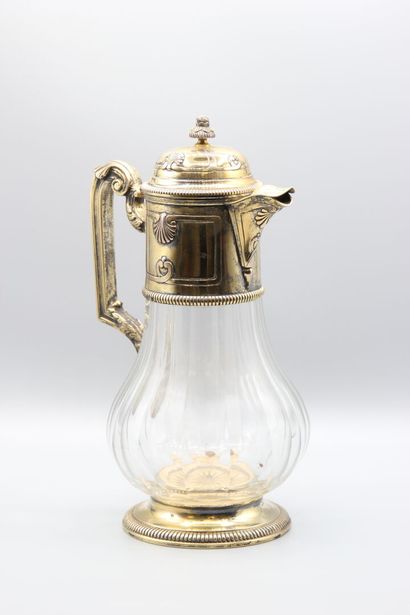Pitcher with orangeade, mounting out of vermeil.
The...