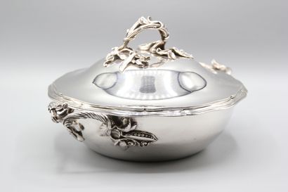 Silver covered vegetable dish with fretel...