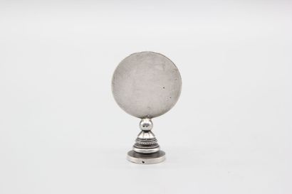 Silver seal representing Joan of Arc in armor...
