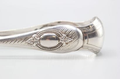 Silver sugar tongs of the Napoleon III period....
