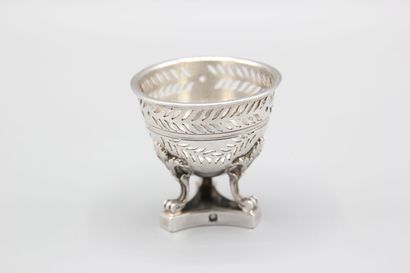 Silver egg cup with three clawed feet with...