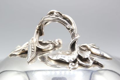 Silver covered vegetable dish with fretel...