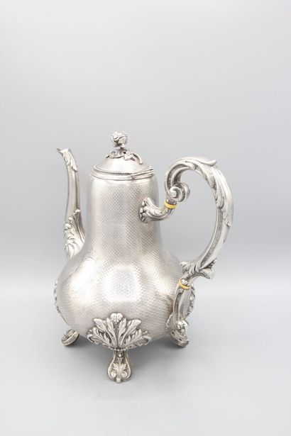 Silver coffee pot
Decorated with guilloche.
Rests...