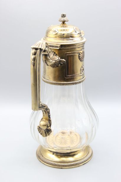 Pitcher with orangeade, mounting out of vermeil.
The...
