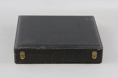 Wooden box with leather on the top of the...