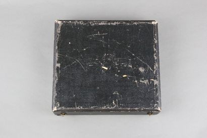 Wooden box with leather on the top of the...