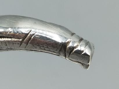 Silver pie plate with chased decoration of...