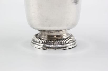 Large silver tulip-shaped tumbler, base decorated...