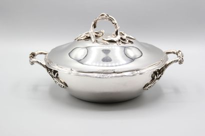 Silver covered vegetable dish with fretel...