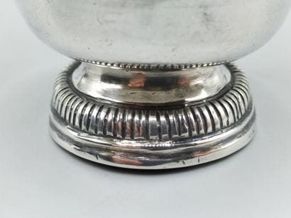 Large silver tulip-shaped tumbler, base decorated...