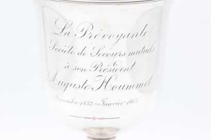 Cup on foot in silver.
On the body is inscribed...