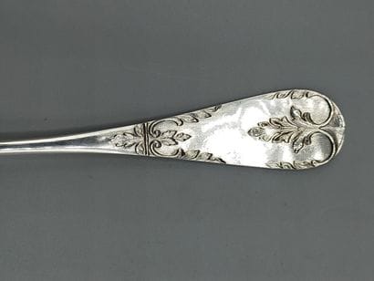 Silver serving ice-cream scoop with a vermeil...