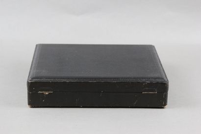 Wooden box with leather on the top of the...