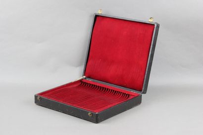 Wooden box with leather on the top of the...