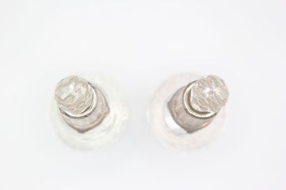 Pair of crystal carafes with coast.
Silver...