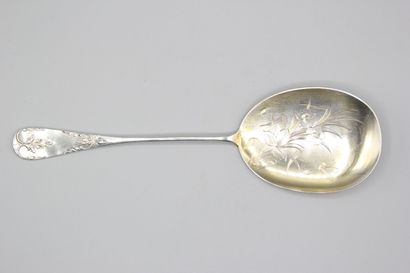Silver serving ice-cream scoop with a vermeil...