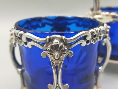 Double silver salad bowl decorated with scrolls...