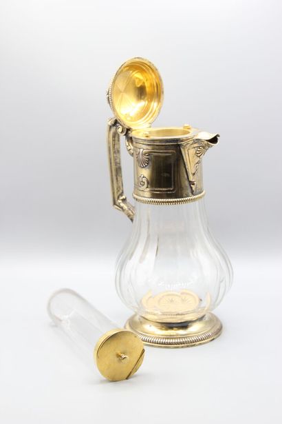 Pitcher with orangeade, mounting out of vermeil.
The...