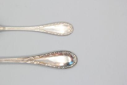 10 silver dessert forks and 11 coffee spoons,...
