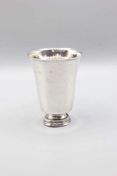 Large silver tulip-shaped tumbler, base decorated...