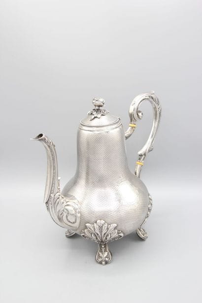 Silver coffee pot
Decorated with guilloche.
Rests...