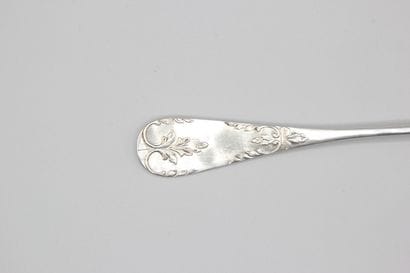 Silver serving ice-cream scoop with a vermeil...