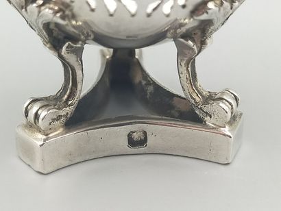 Silver egg cup with three clawed feet with...