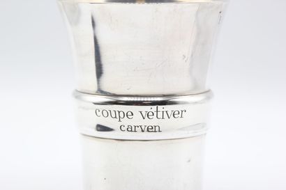 Silver cup of flared form.
Figured 