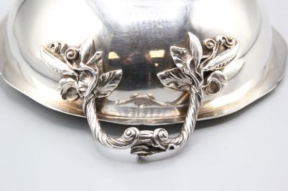 Silver covered vegetable dish with fretel...