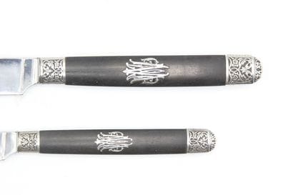 Double Set of knives with ebony handles inlaid...