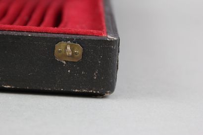 Wooden box with leather on the top of the...