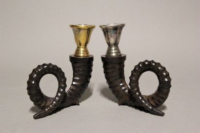 Pair of bronze candlesticks with three patinas...