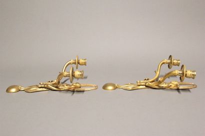 Paire d'appliques en bronze doré et ciselé...