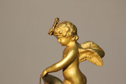 Pendule dite à l'Amour en bronze à deux patines...