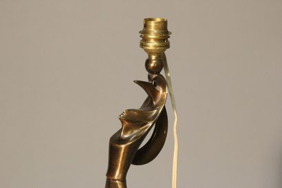 Table lamp in patinated bronze.
Figure a...