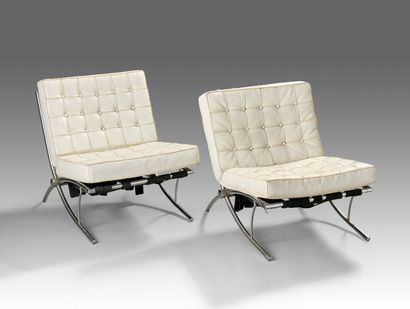 Pair of tubular chromed metal armchairs.
Trim...